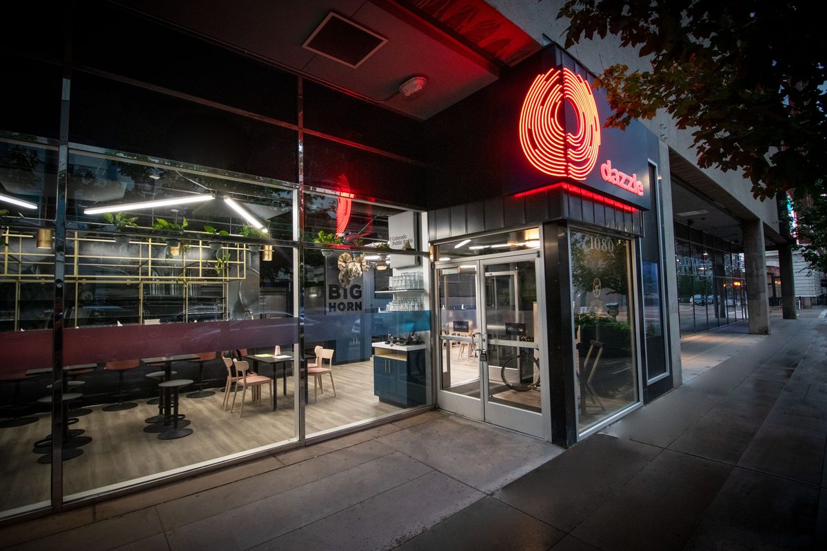 Dazzle jazz club exterior at night with signature red neon sign on 14th Street in downtown Denver