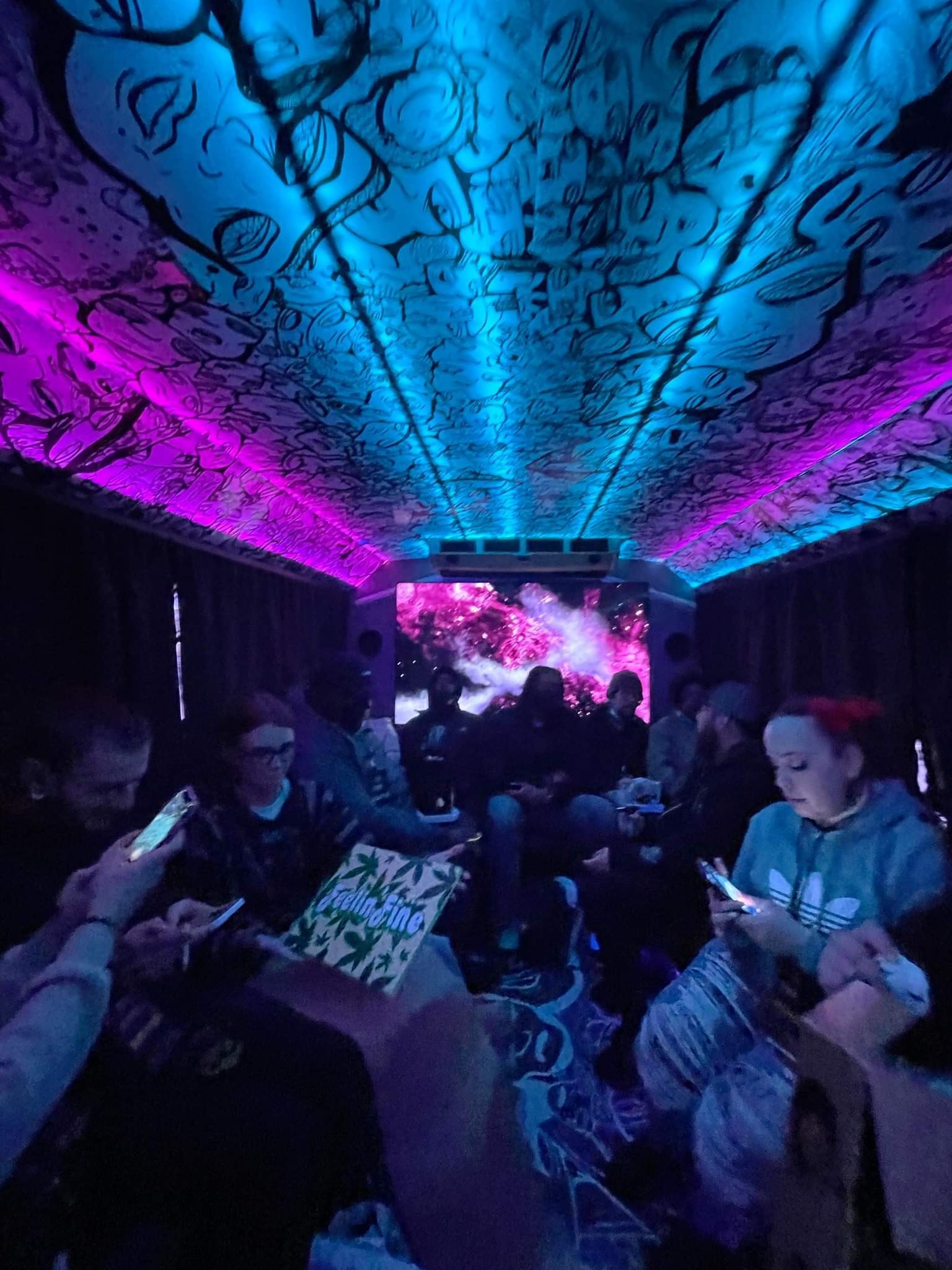 Arion Party Bus interior — wrap-around seating with LED lighting for group transportation to Red Rocks